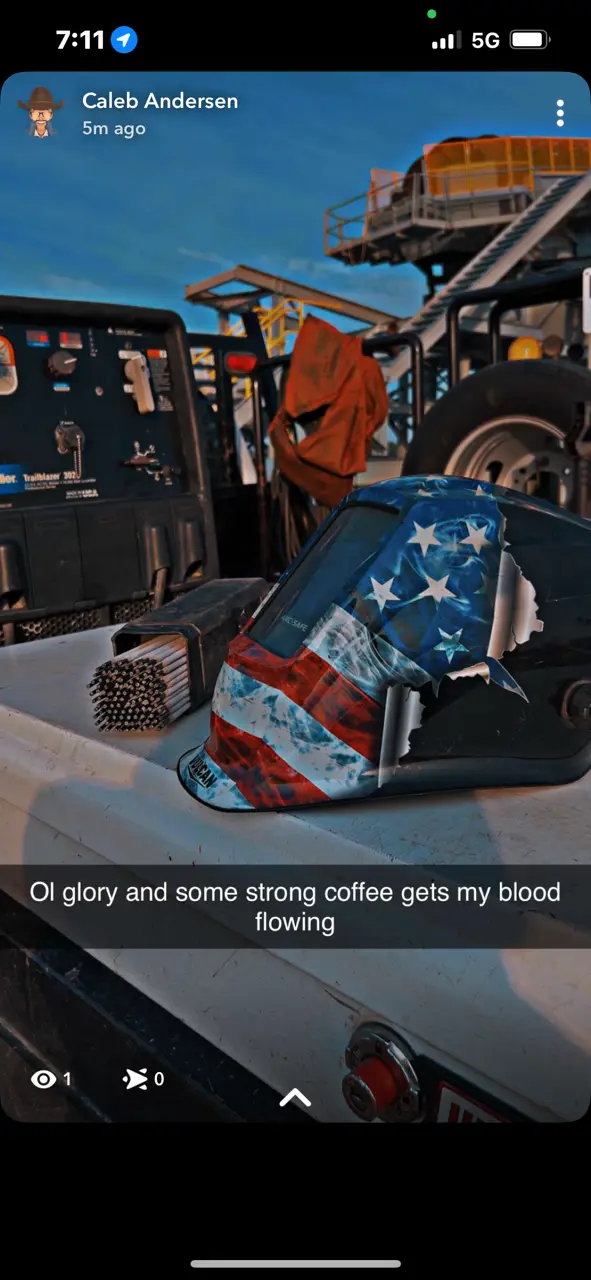 American flag welding helmet on truck with welding equipment