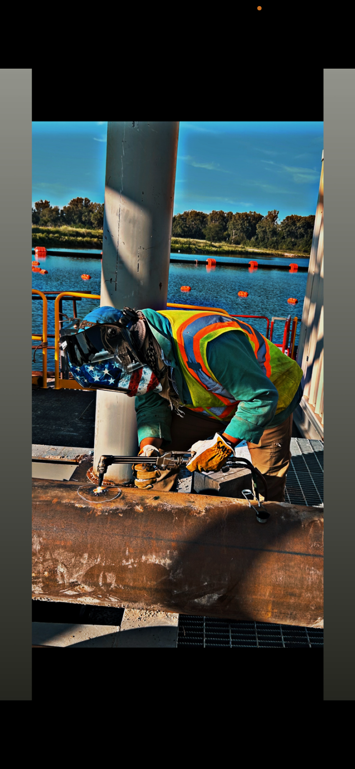 Caleb welding on site